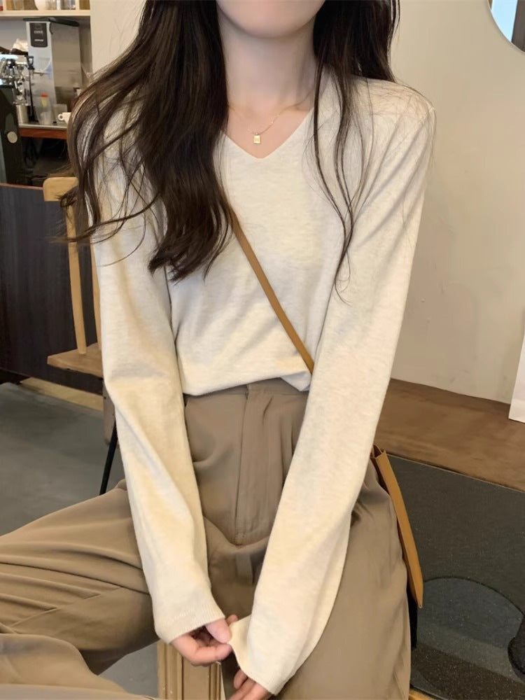 7702
